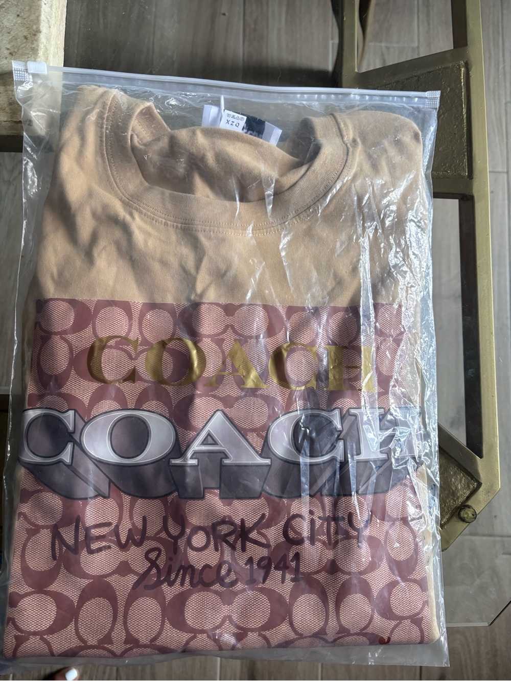 Source Unknown Tan Short-Sleeve Tee with Pink Graphic and Gold Logo